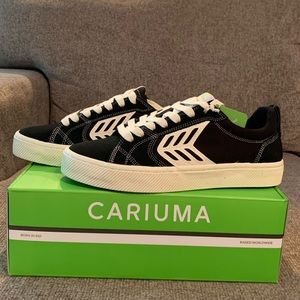 8.5 Mens Cariuma shoes. New, never worn, still in the box.